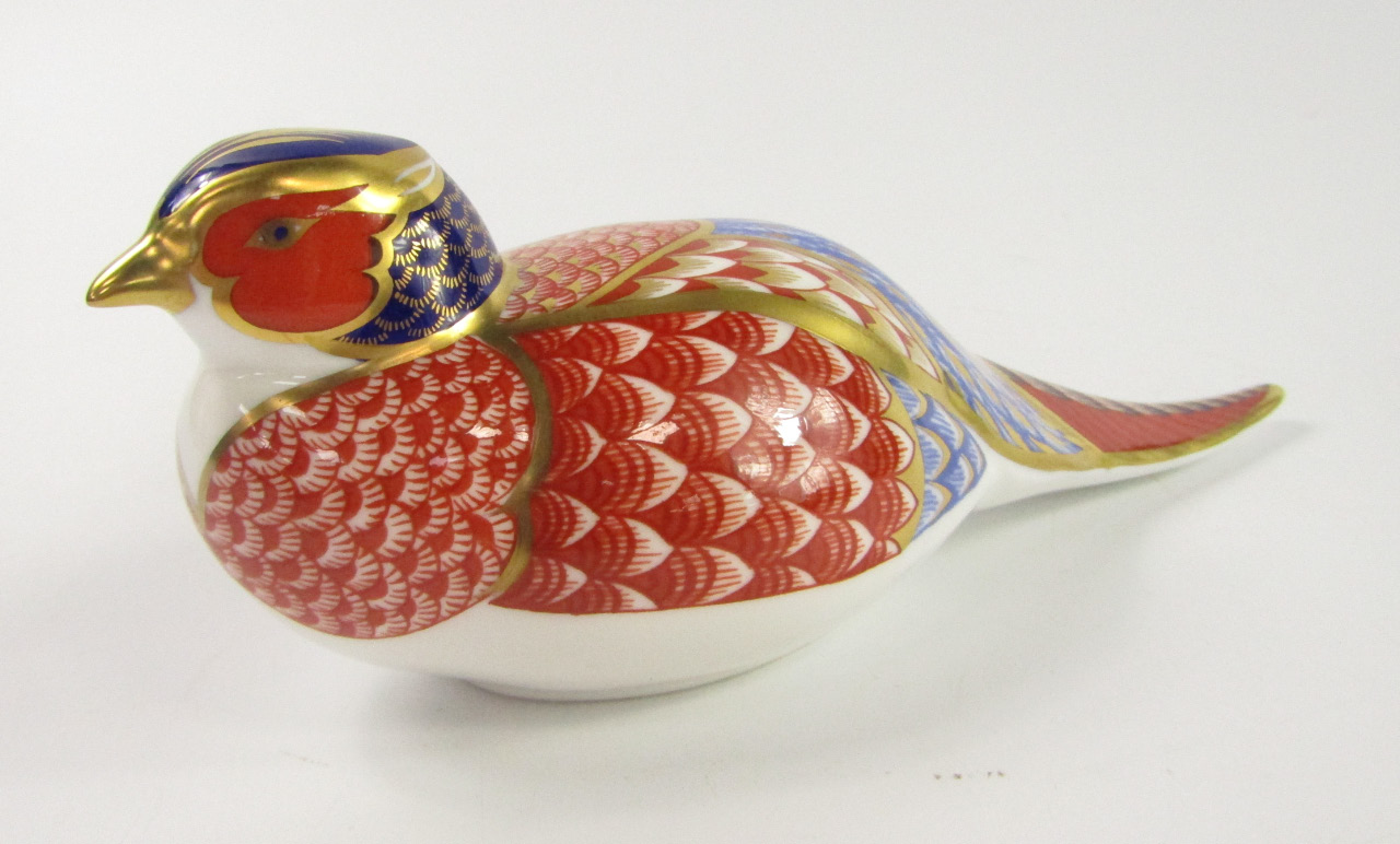 Appraisal: A Royal Crown Derby Imari paperweight modelled as a pheasant