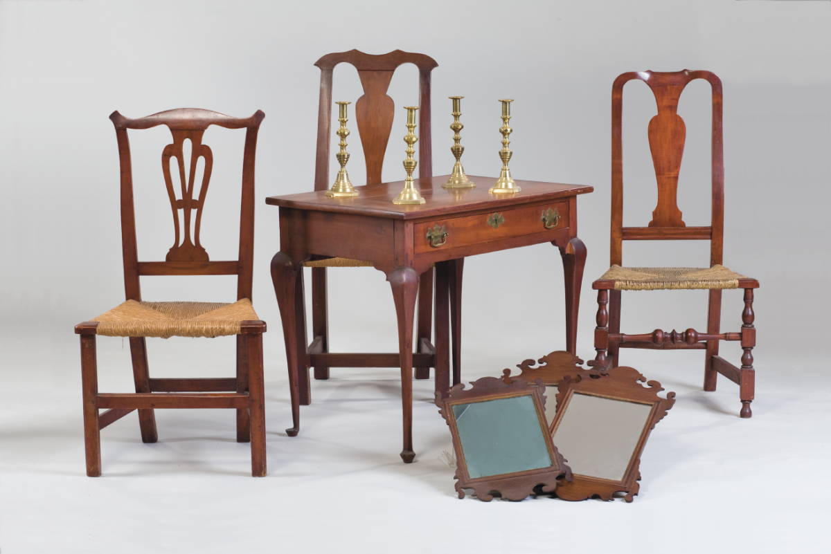 Appraisal: THREE NEW HAMPSHIRE COUNTRY CHIPPENDALE SIDE CHAIRS Including a pair