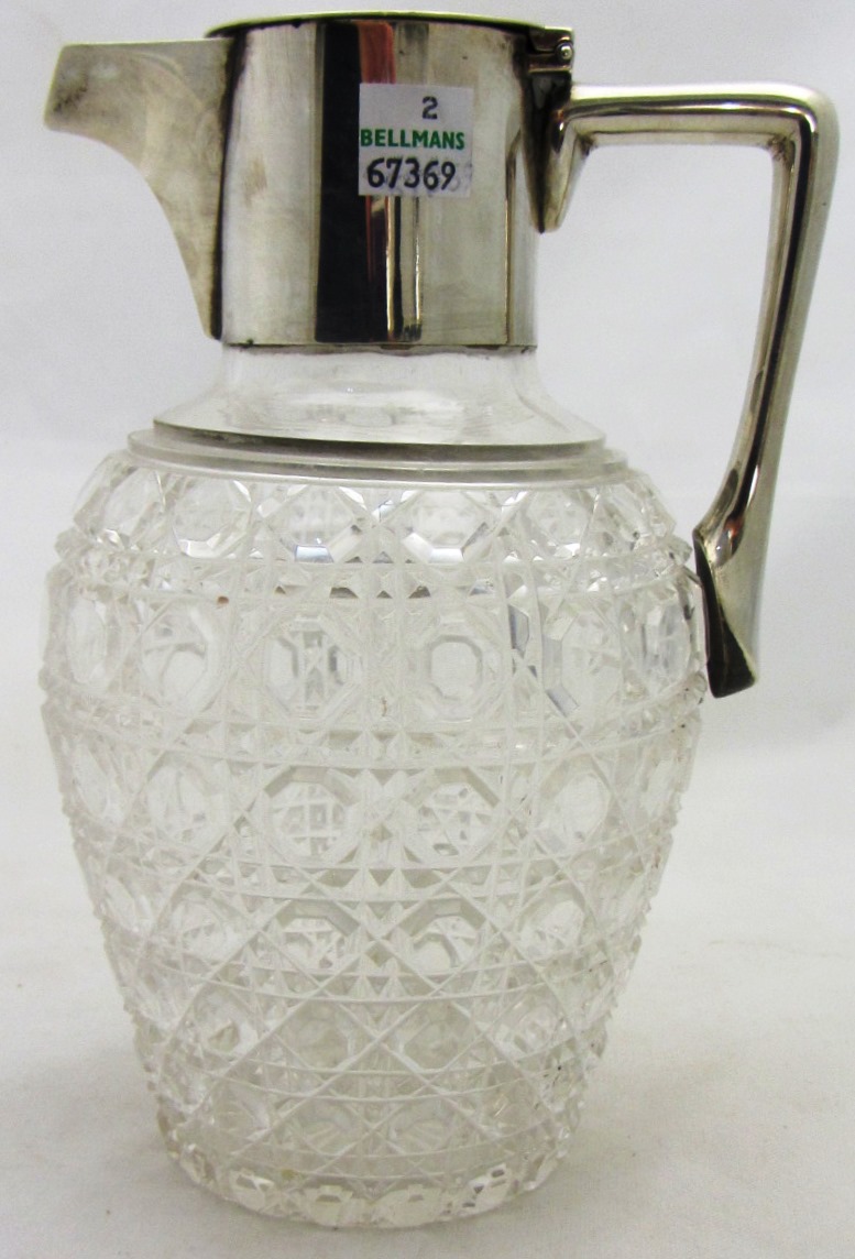 Appraisal: A silver mounted faceted glass claret jug London possibly