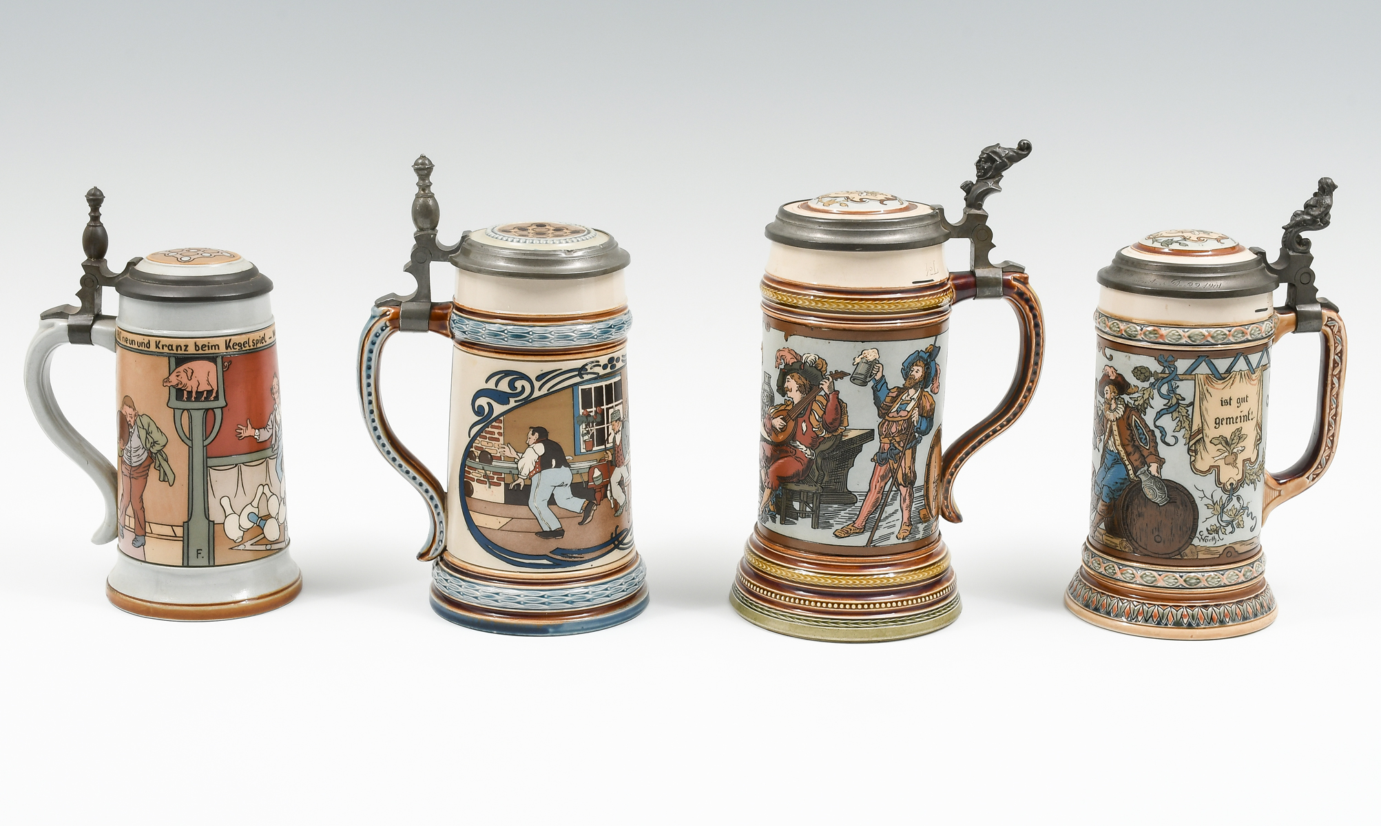 Appraisal: PC METTLACH FIGURAL STEINS Comprising - Mettlach L stein having