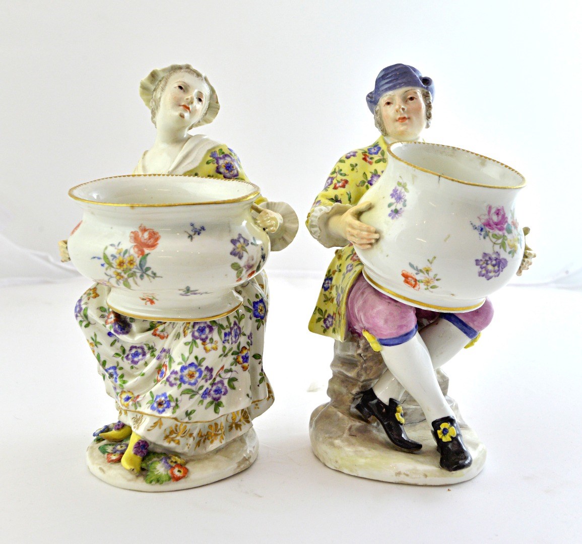 Appraisal: A pair of Vienna porcelain figural salts mid th century