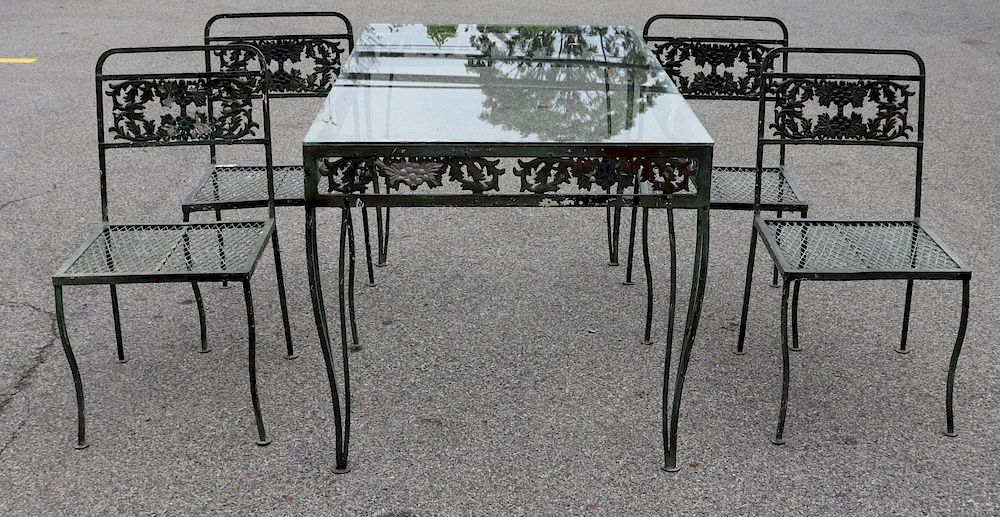 Appraisal: Steel Outdoor Glass Top Table with Chairs Attractive grape with