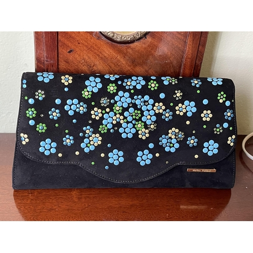 Appraisal: Marino Fabiani Italy clutch with a Vera Pelle strap