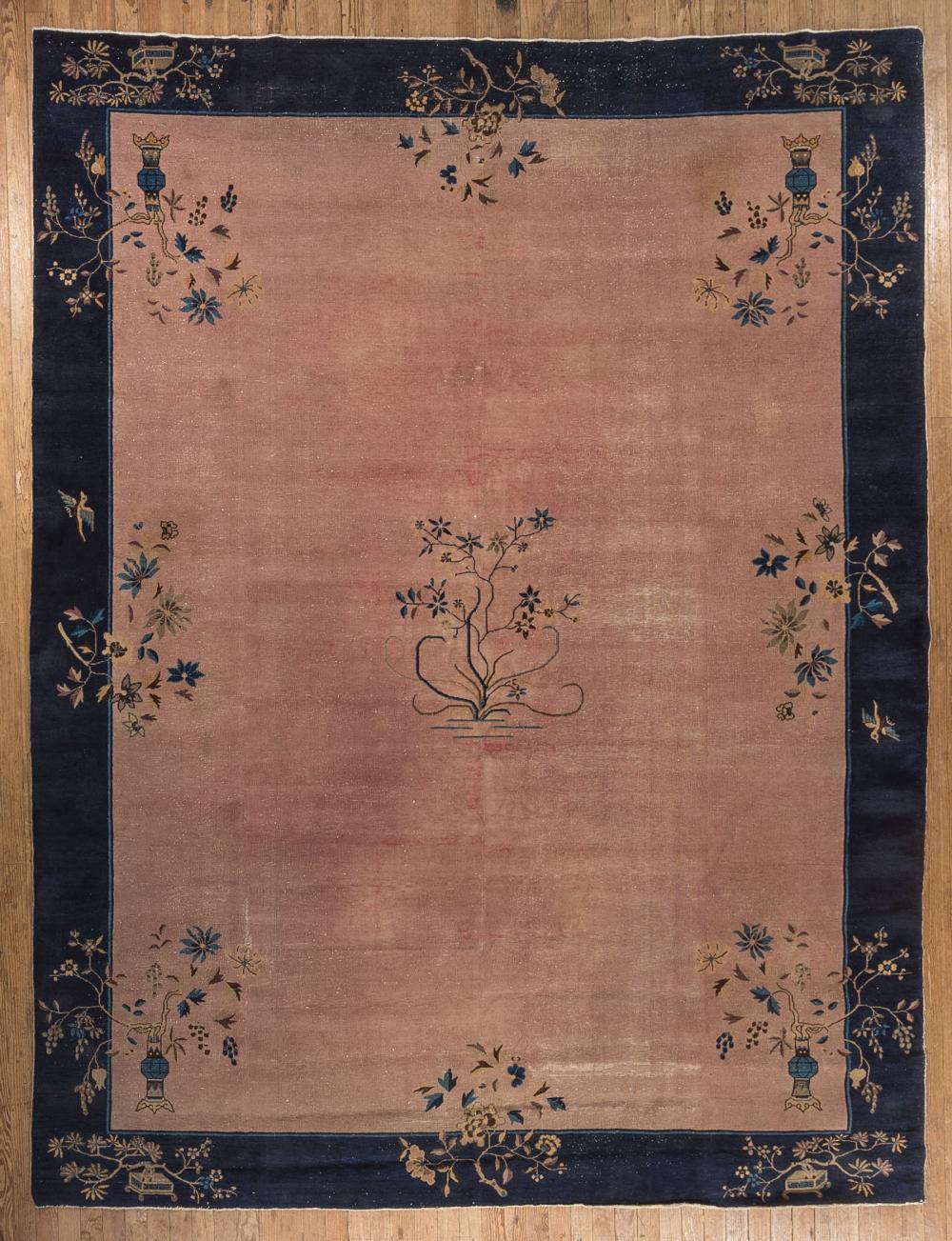 Appraisal: Chinese Nichols Carpet light pink ground blue border floral and