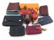 Appraisal: An assortment of leather purses wallets and a hip flask