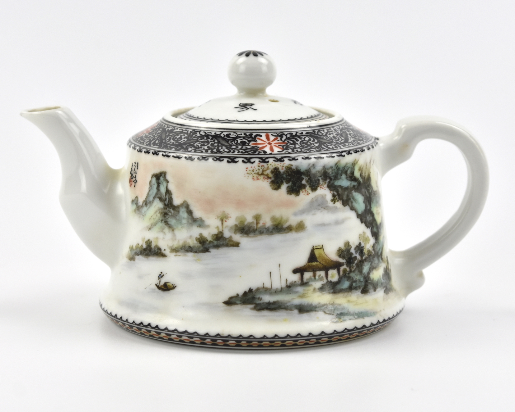 Appraisal: Chinese s teapot decorated with mountaineous scenery with river boat