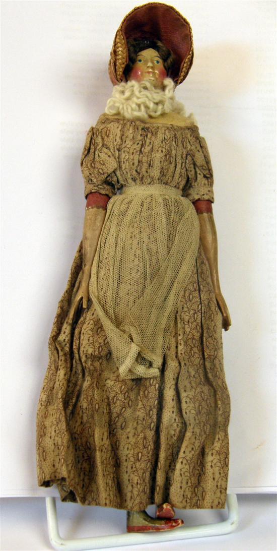 Appraisal: Victorian hand painted wooden doll possibly in original costume and