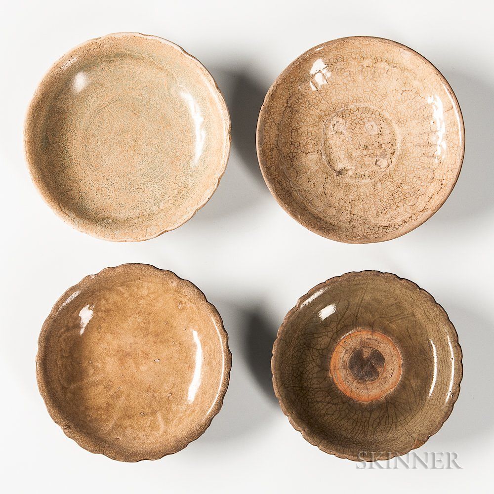 Appraisal: Four Celadon-glazed Dishes Four Celadon-glazed Dishes Vietnam three with floral