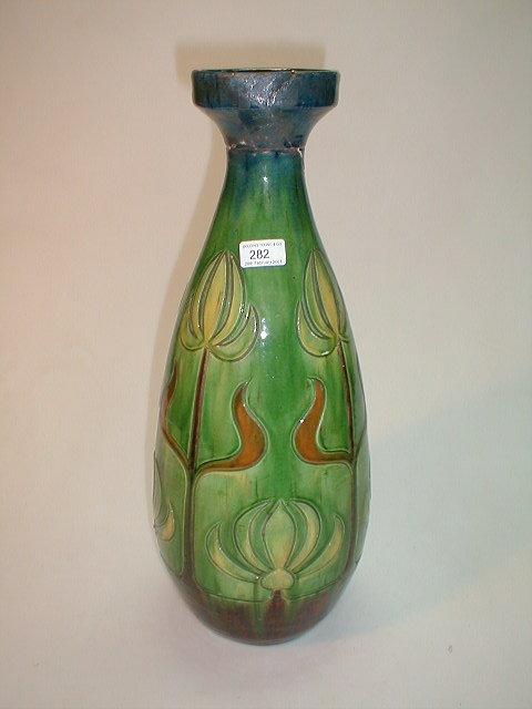 Appraisal: An art pottery vase of inverted ovoid form with a