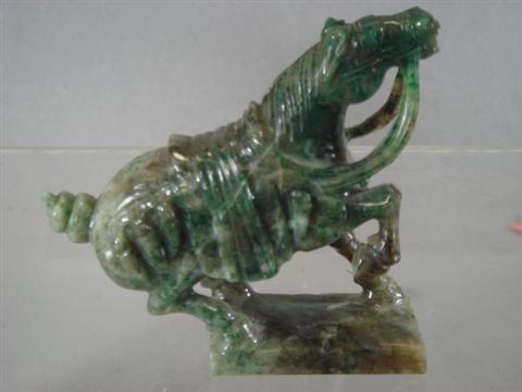 Appraisal: Green jade Chinese war horse th th c h Estimate