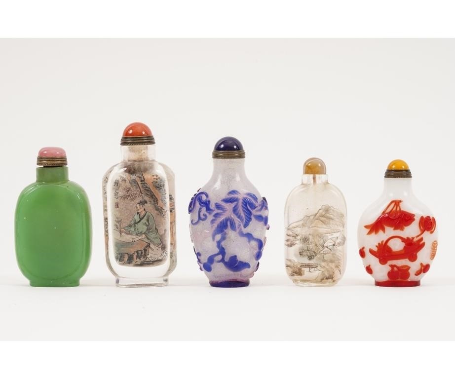 Appraisal: Five Chinese glass stone snuff bottles probably th c Tallest