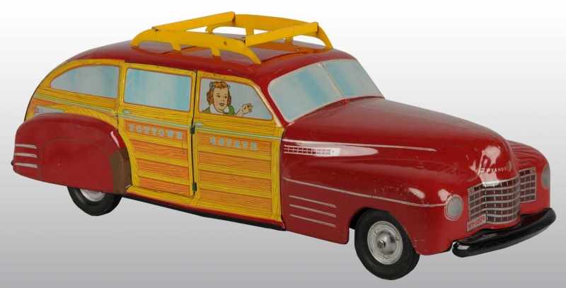 Appraisal: Pressed Steel Wyandotte Woody Station Wagon Toy Description American Scarce