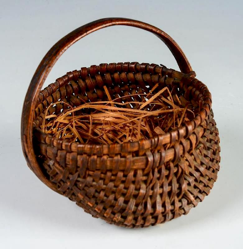 Appraisal: A TH CENTURY MINIATURE BUTTOCKS BASKET With eighteen ribs and