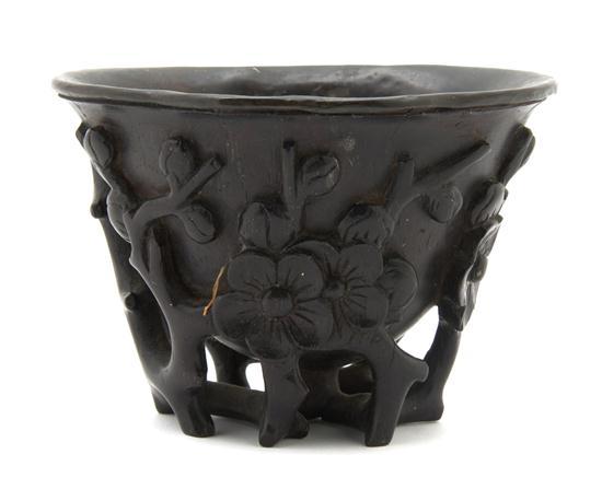 Appraisal: Chinese Hardwood Libation Cup having carved blossoms throughout of magnolia