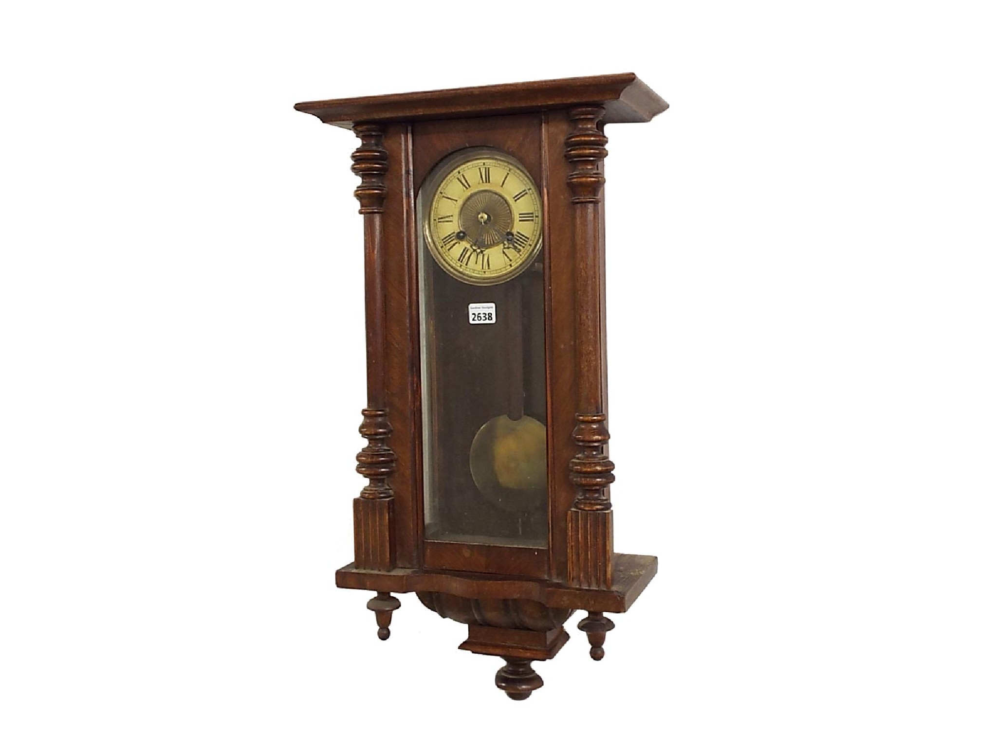 Appraisal: Vienna walnut two train wall clock in a turned case