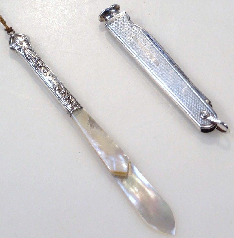 Appraisal: An Elizabeth II silver penknife the folding blade with engine