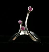 Appraisal: A Ruby Abstract Ring K white gold set with three