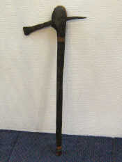 Appraisal: An African hardwood axe with wrought iron blade the blade