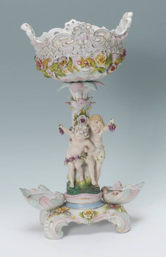 Appraisal: SITZENDORF GERMAN PORCELAIN CENTERPIECE COMPOTE Base and body with figural