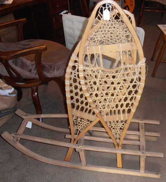 Appraisal: PAIR OF WOODEN SNOW SHOES AND A SNOW SLED