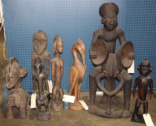 Appraisal: African carved wood decorative figures i lot of African carved