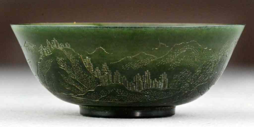 Appraisal: Chinese Qing Carved Jade BowlFinely carved to depict a landscape