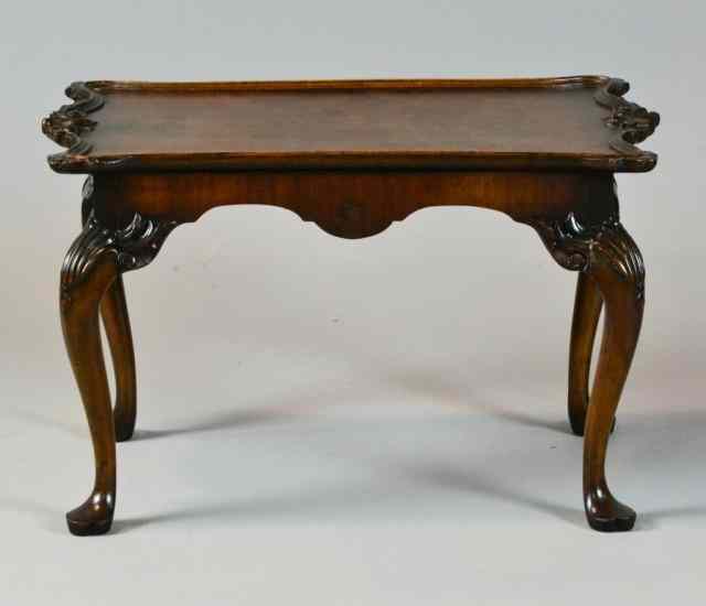 Appraisal: An English Carved Walnut Occasional TableIn the Queen Ann style