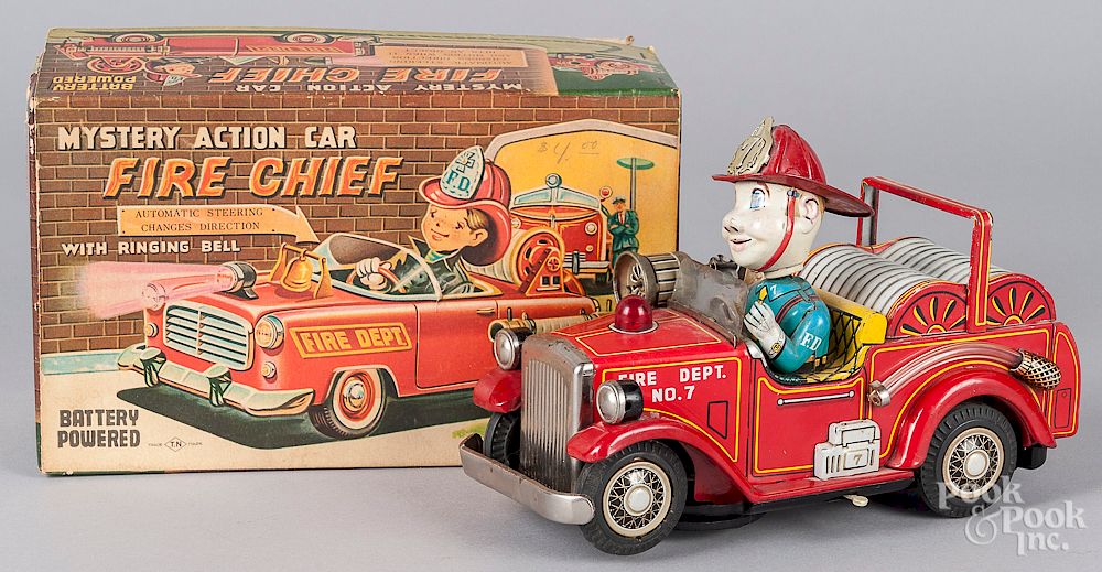 Appraisal: Japanese battery operated tin litho fire chief car Japanese battery