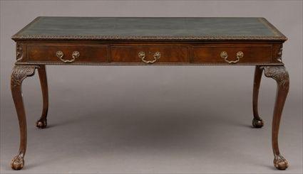 Appraisal: GEORGE III MAHOGANY LIBRARY TABLE The top with gold-tooled green