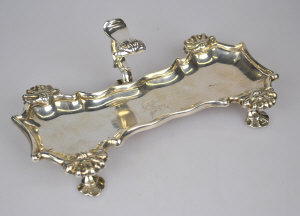 Appraisal: A George III silver snuffers tray of shaped rectangular form