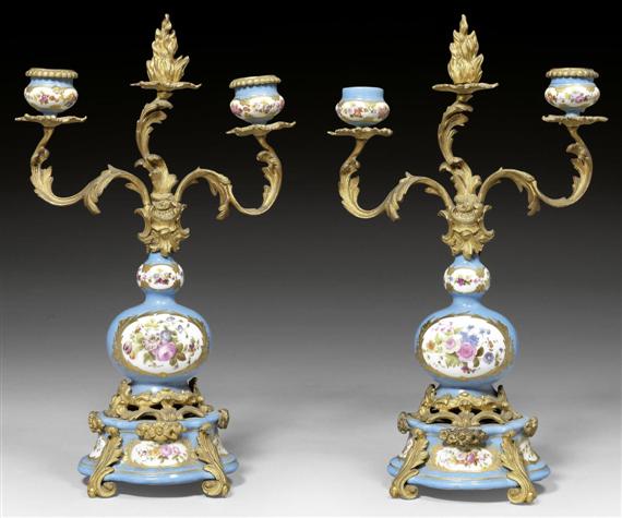 Appraisal: PAIR OF SMALL PORCELAIN CANDELABRAS A LA SEVRES Louis XVI