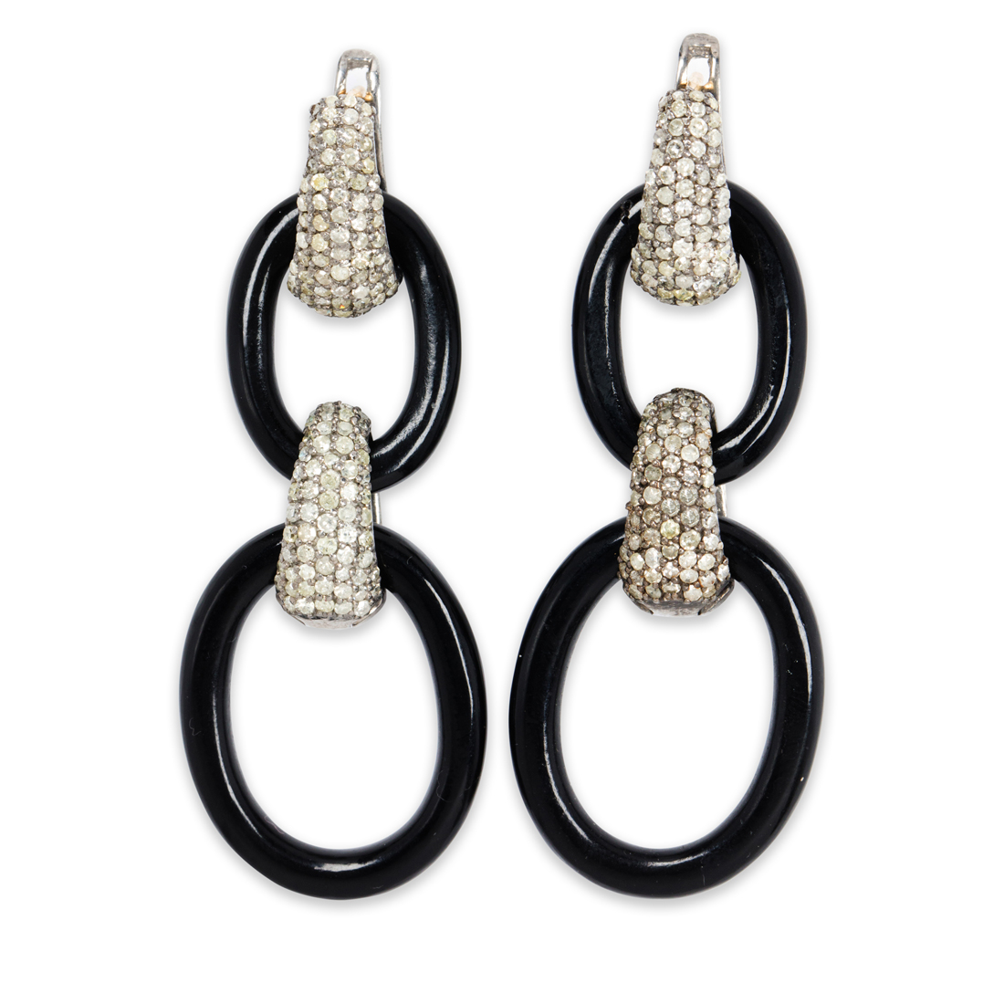 Appraisal: A PAIR OF ONYX AND DIAMOND EARRINGS A pair of