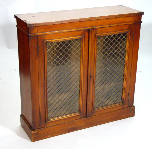 Appraisal: Victorian walnut Pier cabinet fitted a pair of glazed doors