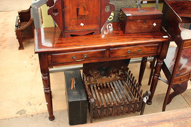 Appraisal: A GEORGIAN STYLE HARDWOOD SIDE TABLE two frieze drawers and