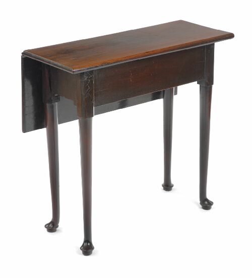 Appraisal: A George II mahogany side table the hinged single flap