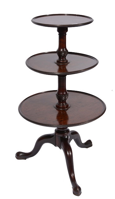 Appraisal: A GEORGE III MAHOGANY THREE TIER DUMB WAITER of graduating