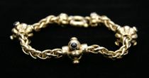 Appraisal: An K Gold Bracelet K yellow gold with linked rope