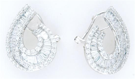 Appraisal: Ornate diamond earrings approximately one hundred eighty-six round and baguette-cut