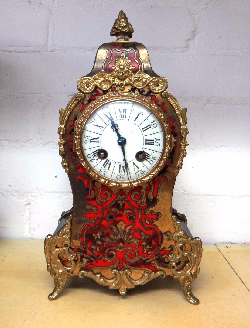 Appraisal: A boulle work mantel clock late th century with foliate