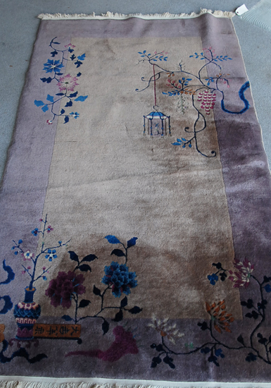 Appraisal: A Nichols Chinese Art Deco Rug having a tan ground