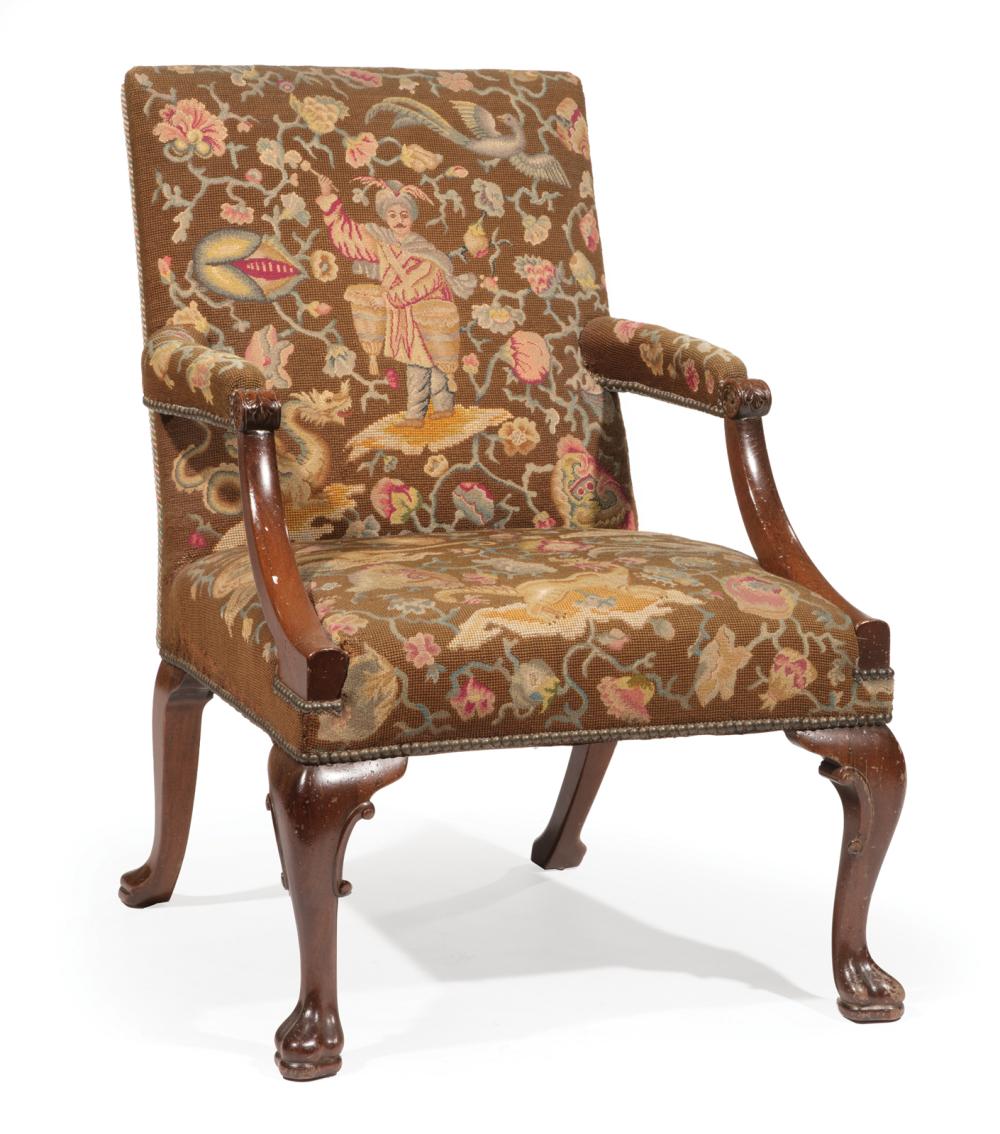 Appraisal: Antique Georgian-Style Mahogany Library Armchair needlepoint upholstery scrolled arms cabriole