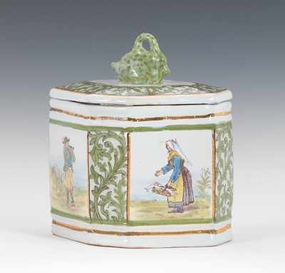 Appraisal: A Quimper Bonbonniere Hand decorated faience box with lid elongated