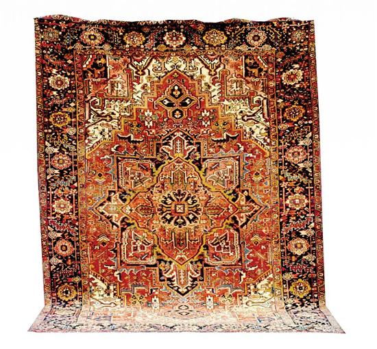 Appraisal: Persian Heriz carpet ' x ' of border missing at