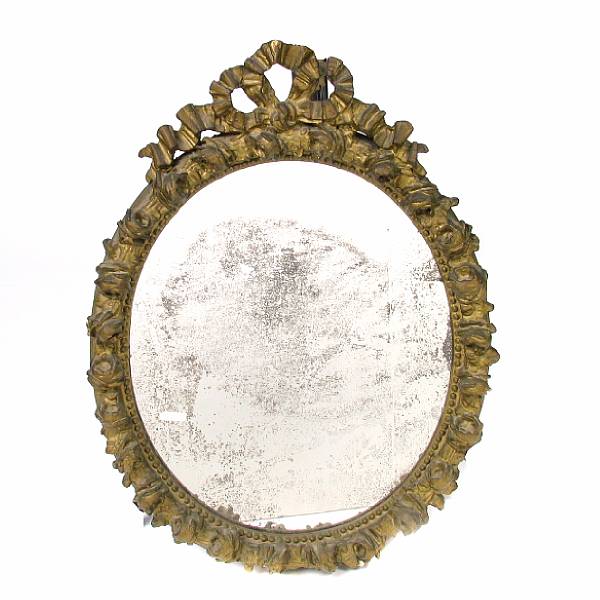 Appraisal: A Rococo style oval mirror height in width in