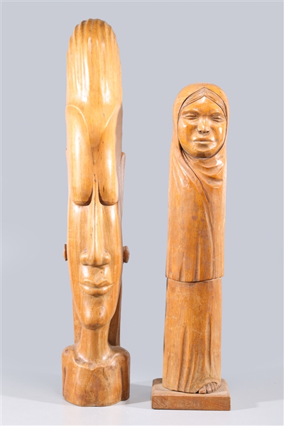 Appraisal: Two tribal wood carvings one on custom base overall good