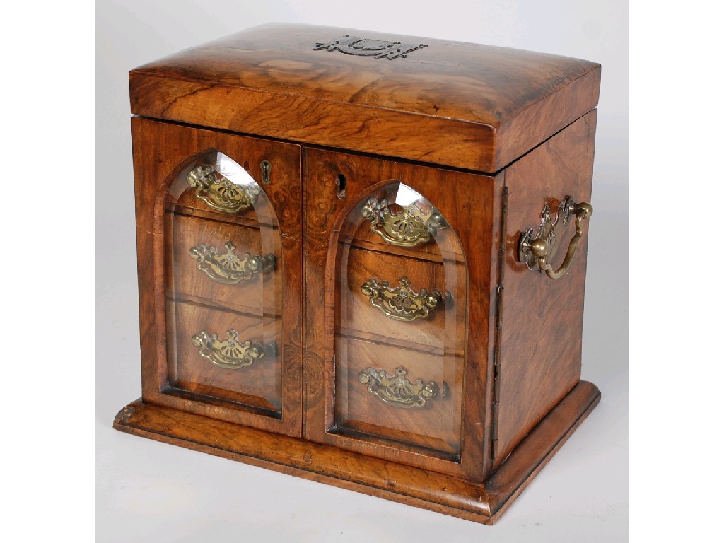 Appraisal: VICTORIAN FIGURED WALNUTWOOD JEWEL CASKET with hinged shallow domed lid