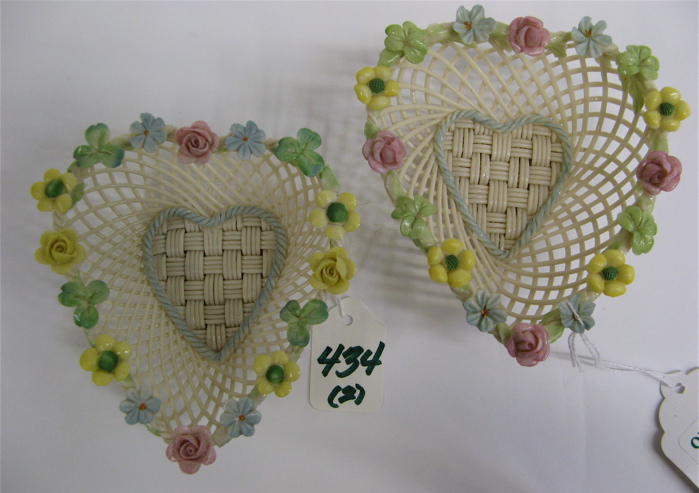 Appraisal: TWO IRISH BELLEEK HEART-SHAPED SMALL BASKETS Each four strands and