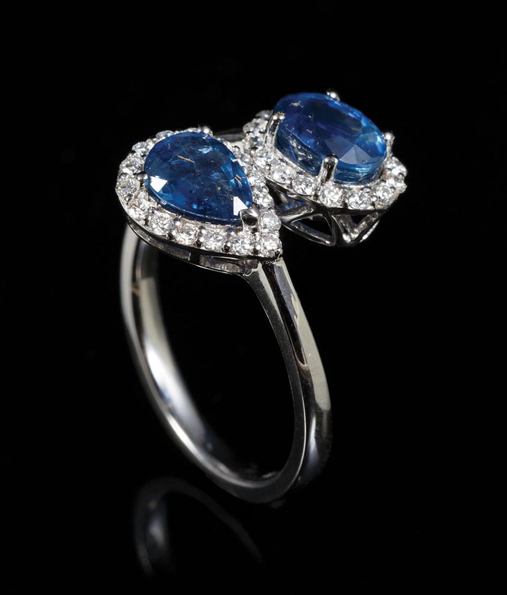 Appraisal: kt White Gold Blue Sapphire and Diamond Ring center prong