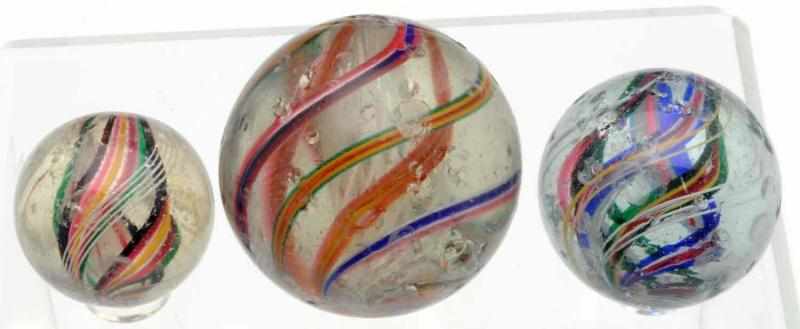 Appraisal: Lot of Swirl Marbles Smallest is a multicolored divided core