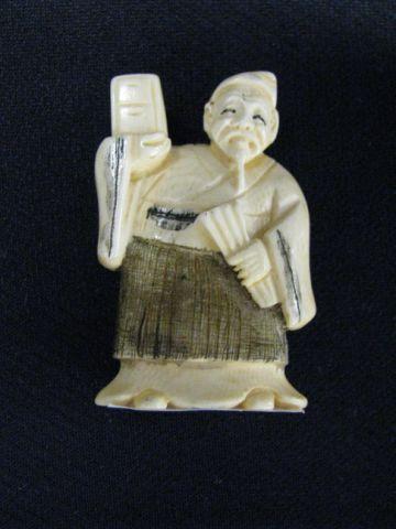 Appraisal: Carved Ivory Netsuke of a Scholar